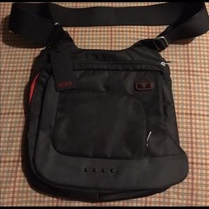 tumi tech crossbody bag